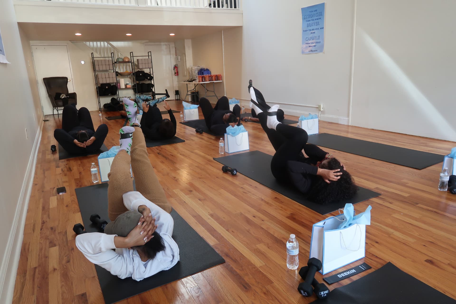 Women moving together during the Revitalize 2024 fitness experience